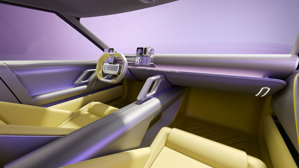 Tableau de bord du Hyundai Concept Three, avec habitacle jaune et interfaces numériques futuristes.
